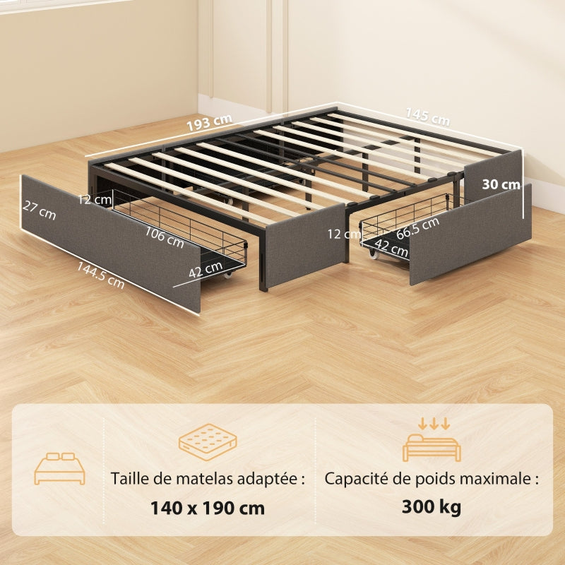 Tiroirs de rangement ouverts sous le sommier du lit